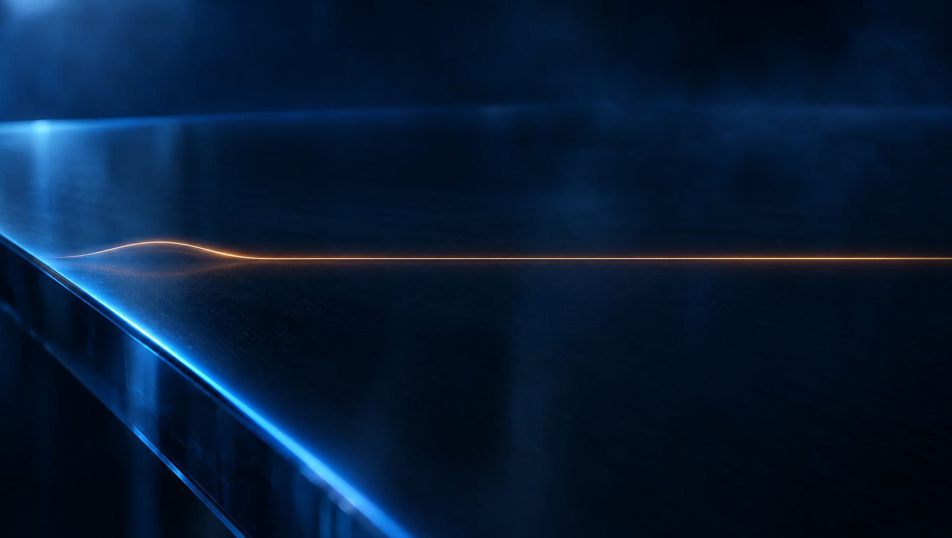 A thin orange thread of light settling into one straight line across a calm dark glass surface with a soft blue edge